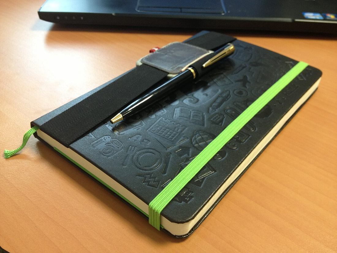 A notebook and pen